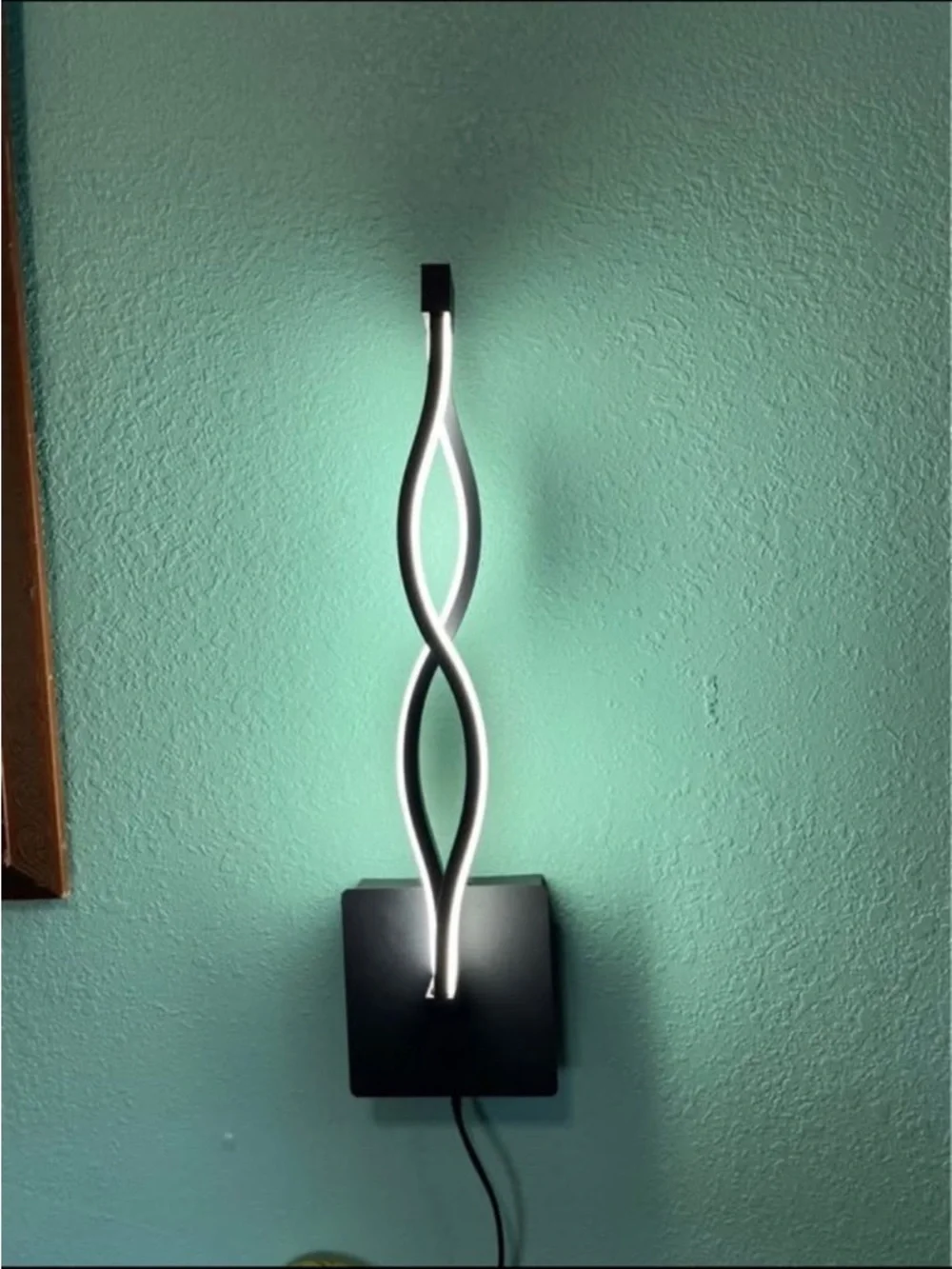 Modern Black LED Wall Sconce - Twisted Ribbon Design